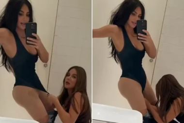Kim Kardashian, çıtçıtlı body giyerken yardım aldı