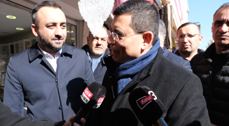 Tütüncü’den esnaf ziyareti